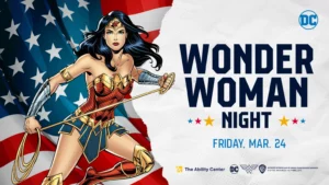 Wonder Women image strong stance with americn flag in the background - with The Ability Center logo